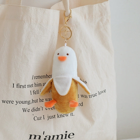 Duckana Plush Keychains: Cute and Comfy!: white, light green duck character, cute cartoon style