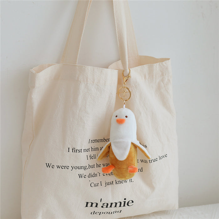 Duckana Plush Keychains: Cute and Comfy!: white, light green duck character, cute cartoon style