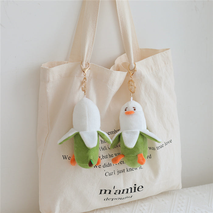 Duckana Plush Keychains: Cute and Comfy!: white, light green duck character, cute cartoon style