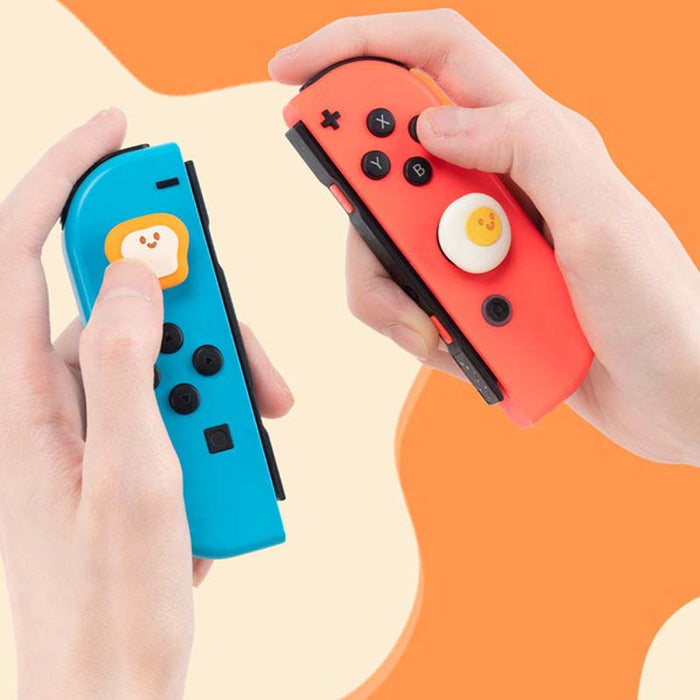 Egg x Toast Switch OLED Joystick Caps: mint green, light blue toast and fried egg character theme, kawaii cartoon style