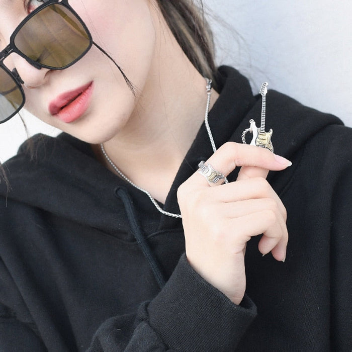 Electric Guitar Necklace with a Two Tone Design: silver, gold electric guitar, detailed miniature style