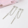 Fashion Earrings with Lengthy Tassels: silver pair of dangling chain earrings, minimal style