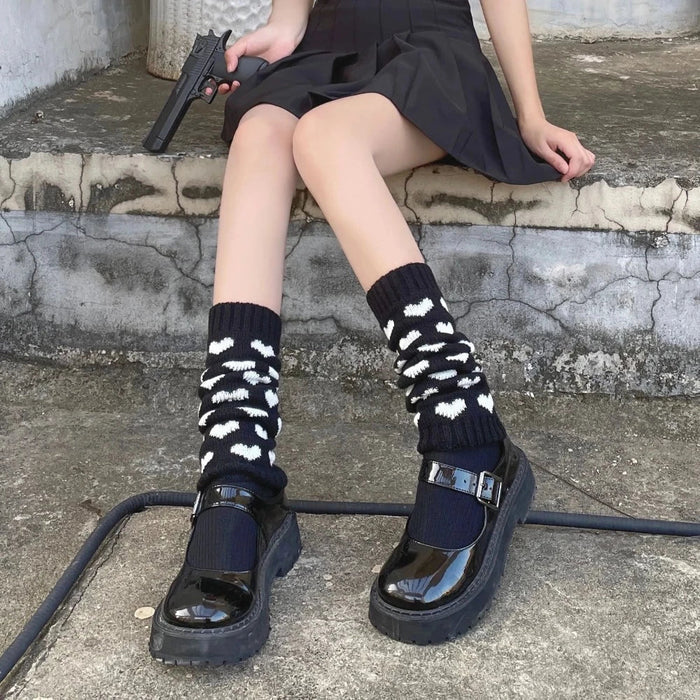 Feminine Leg Cozies: black, white striped knee-high socks, playful style