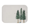Forest Dweller Gnome Home Accents Bath Mat: off-white, dark green evergreen trees and a small gnome, illustrated woodland sty
