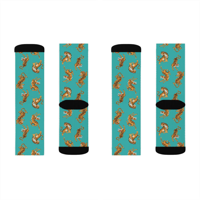 Fun Tiger Novelty Socks: teal, orange tigers, cartoon pattern style