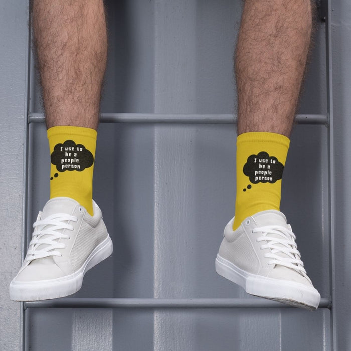 Funny Novelty Socks, Former Social Butterfly Design: yellow, black cartoon sheep-like black characters; text graphic