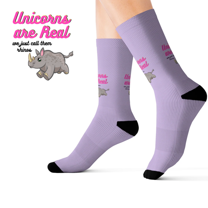 Funny Novelty Socks: Rhino Design with a Unicorn Twist: lavender, black rhinoceros/unicorn-themed graphic, cartoon, humorous