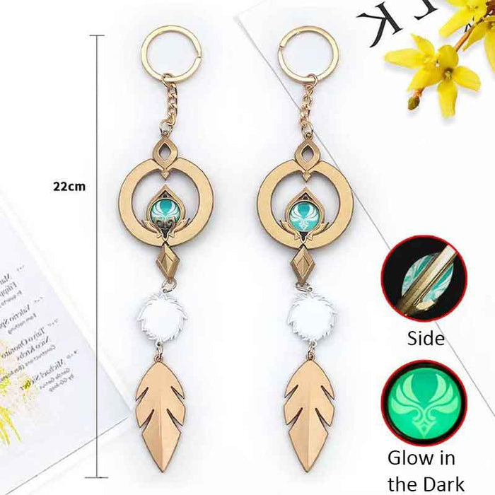 Genshin Impact Scaramouche Keychain: Glowing Vision: gold, turquoise ornamental feather motif, ornamental fantasy style