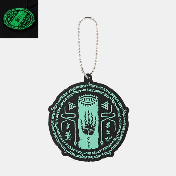 Glow in the Dark Zelda Keychains: black, mint green stylized mystical eye and hand symbol, graphic, occult-inspired, cartoon