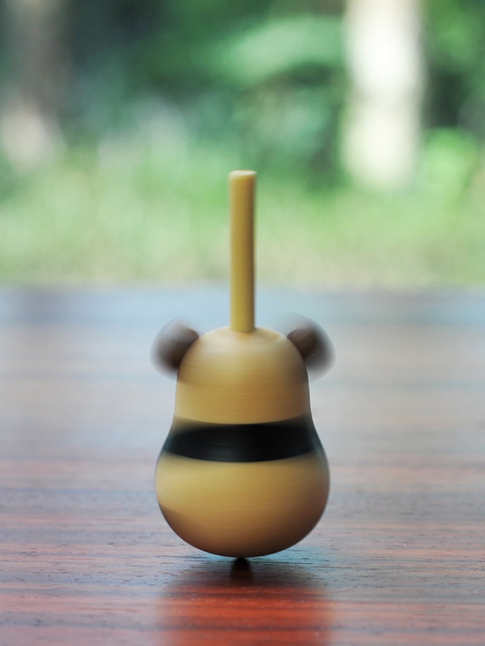 Handcrafted Wood Panda Top with Base: light natural wood, dark brown panda, minimal cartoon style
