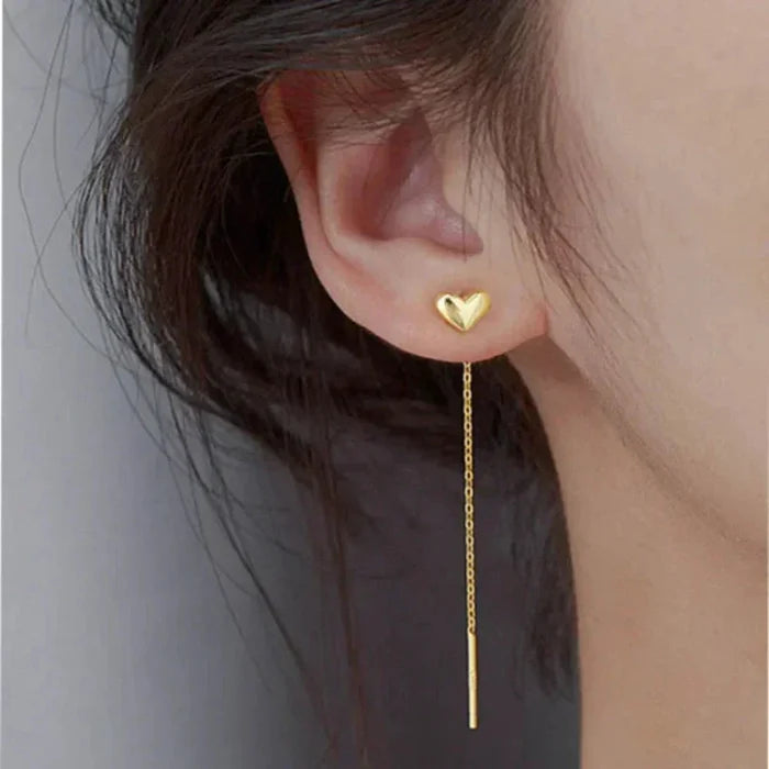 Heart-Shaped Earrings with a Delicate Dangling Design: silver heart, minimal style