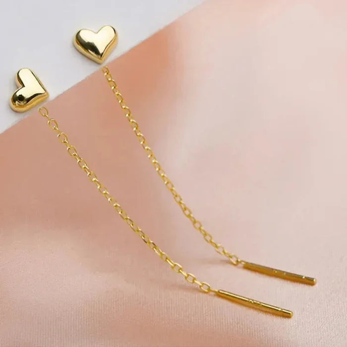 Heart-Shaped Earrings with a Delicate Dangling Design: silver heart, minimal style