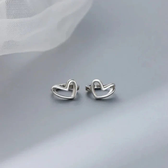 Heart-Shaped Silver Hoop Earrings: silver heart, minimal style