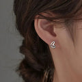 Heart-Shaped Silver Hoop Earrings: silver heart, minimal style