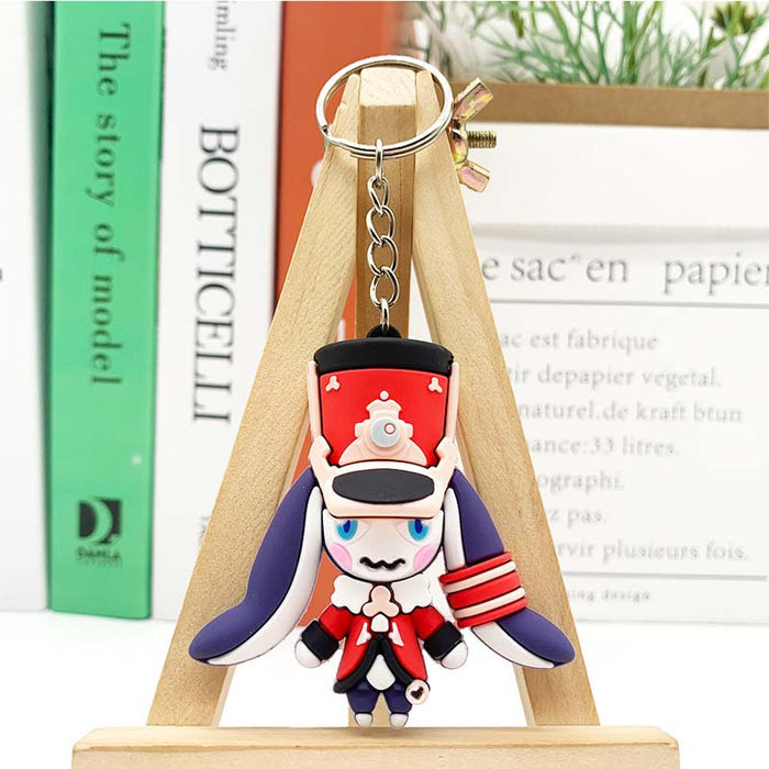 Honkai Star Rail Pom-Pom Keychain: Captivating and Durable: red, navy blue cartoon rabbit-like character in a red military-st