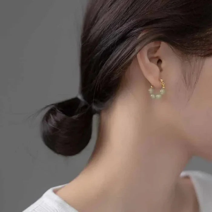 Hoop Earrings with Jade Beads: pale translucent yellow-green, gold pair of hoop earrings, minimal style