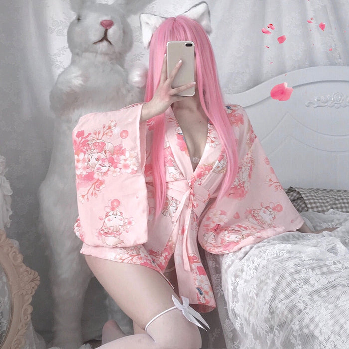 Japanese-inspired Kimono with Floral Pattern: light pink, white kimono-style robe, kawaii style