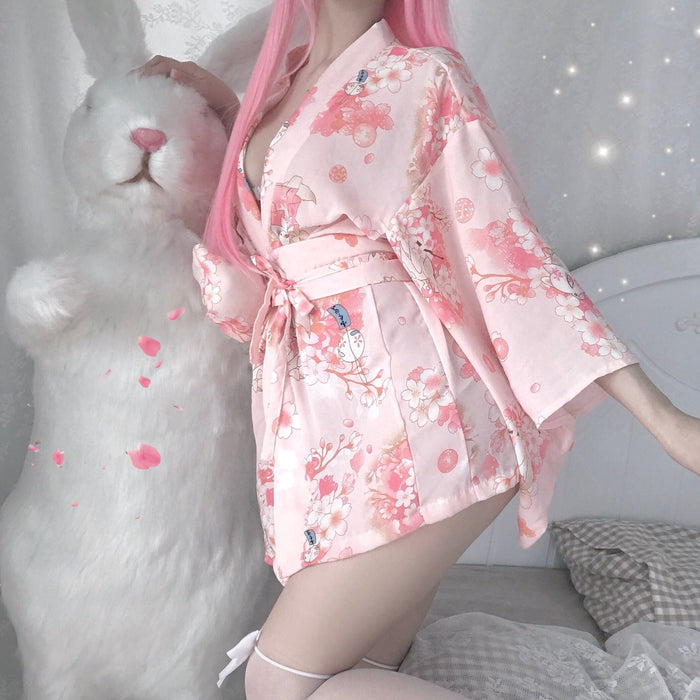 Japanese-inspired Kimono with Floral Pattern: light pink, white kimono-style robe, kawaii style