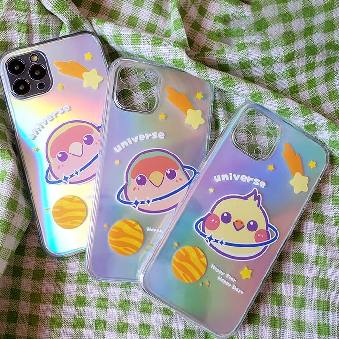 Kawaii Cockatiel iPhone Case: iridescent pastel, yellow cartoon cat with ringed planet motif, kawaii cartoon style
