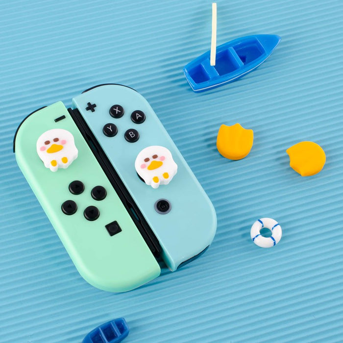Kawaii Duck Joystick Caps for Switch: mint green, light blue duck, kawaii cartoon style