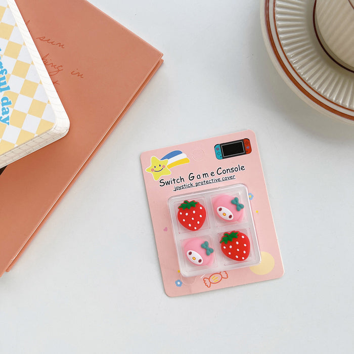 Kawaii Switch Thumb Grips with Joystick Caps: light blue, yellow Pikachu-like yellow character faces and blue bows, cute cart