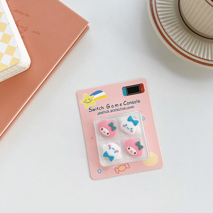 Kawaii Switch Thumb Grips with Joystick Caps: light blue, yellow Pikachu-like yellow character faces and blue bows, cute cart