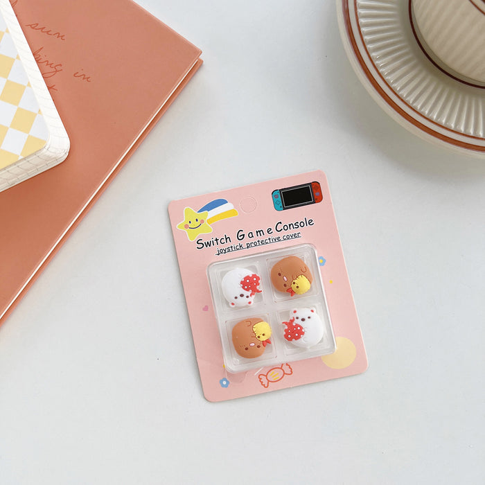 Kawaii Switch Thumb Grips with Joystick Caps: light blue, yellow Pikachu-like yellow character faces and blue bows, cute cart
