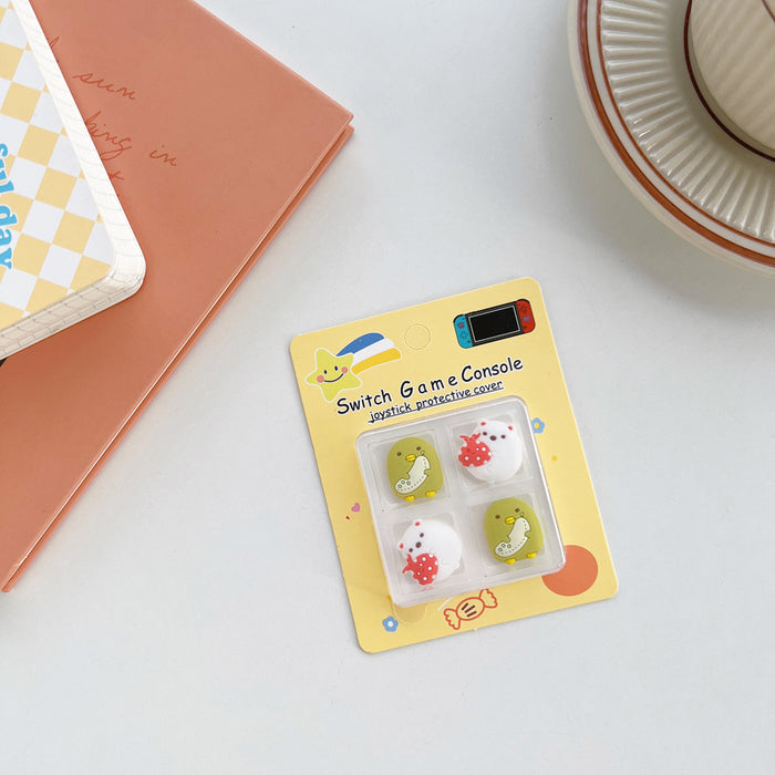 Kawaii Switch Thumb Grips with Joystick Caps: light blue, yellow Pikachu-like yellow character faces and blue bows, cute cart