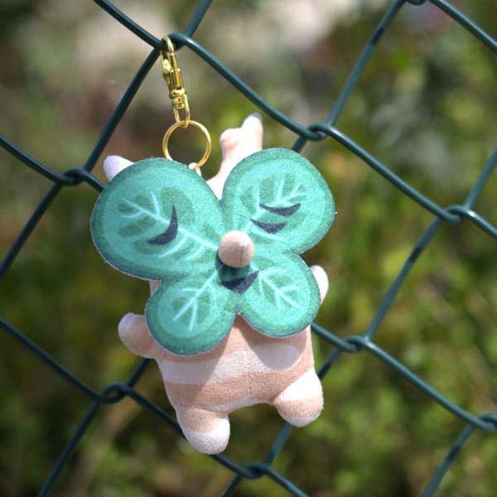 Korok Plushies with Interchangeable Faces and Sound: green, orange cartoon orange animal character with green leaf characters