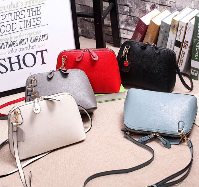 Ladies' Shoulder Bag with Double Zipper Opening: bright red, black shoulder bag, minimal style