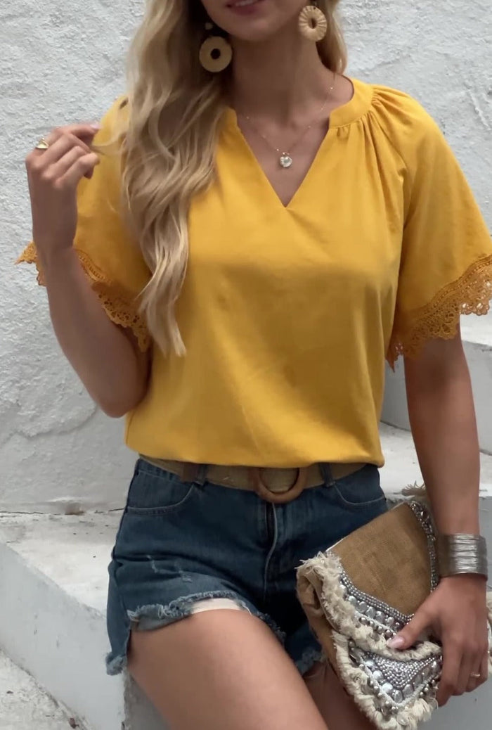 Ladies' V-Neck Tee with Delicate Lace Accents: white short-sleeve blouse/top, casual feminine style