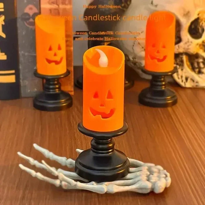 LED Electronic Candle with Halloween Pumpkin Design: orange, black carved jack-o'-lantern pumpkins, Halloween, spooky decorat