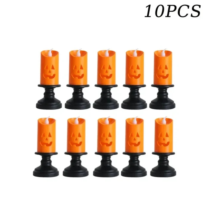 LED Electronic Candle with Halloween Pumpkin Design: orange, black carved jack-o'-lantern pumpkins, Halloween, spooky decorat
