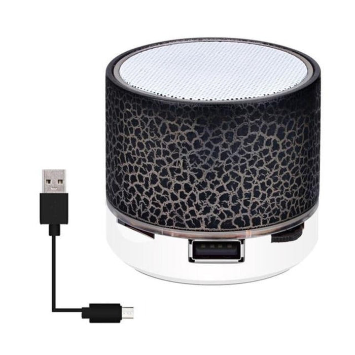 LED Mini Bluetooth Speaker, Portal Edition: bright green, white portable speaker with USB charging cable, minimal modern styl