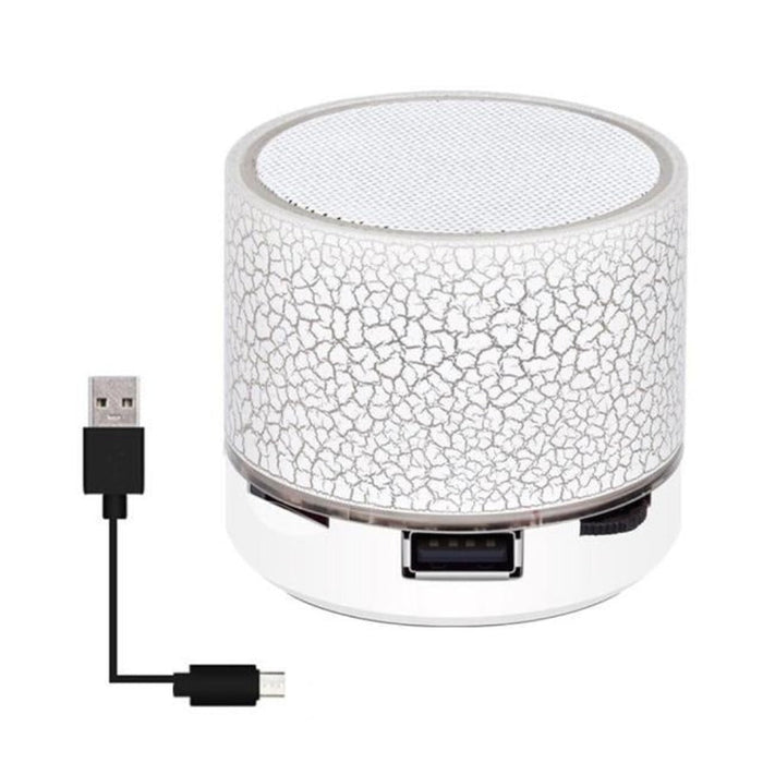 LED Mini Bluetooth Speaker, Portal Edition: bright green, white portable speaker with USB charging cable, minimal modern styl