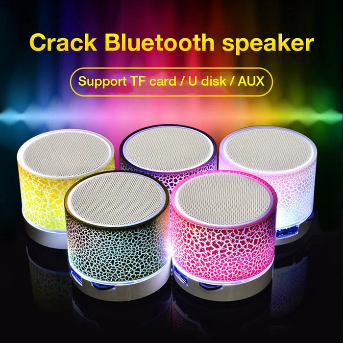 LED Mini Bluetooth Speaker, Portal Edition: bright green, white portable speaker with USB charging cable, minimal modern styl