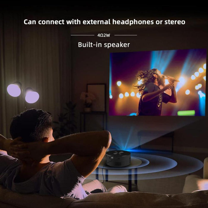 Mini Home Theater Projector, Compact Entertainment Anywhere: black, blue portable projector with smartphone resting on top, m