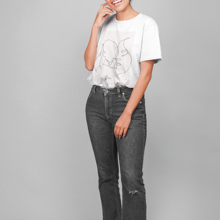 Mother and Infant Tee for Women: white, black abstract line-art faces, minimalist line art style