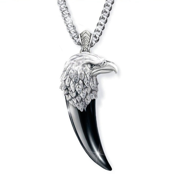 Necklace with Eagle Claw and Head Design: silver, black eagle head and talon/claw-shaped pendant, realistic animal motif styl