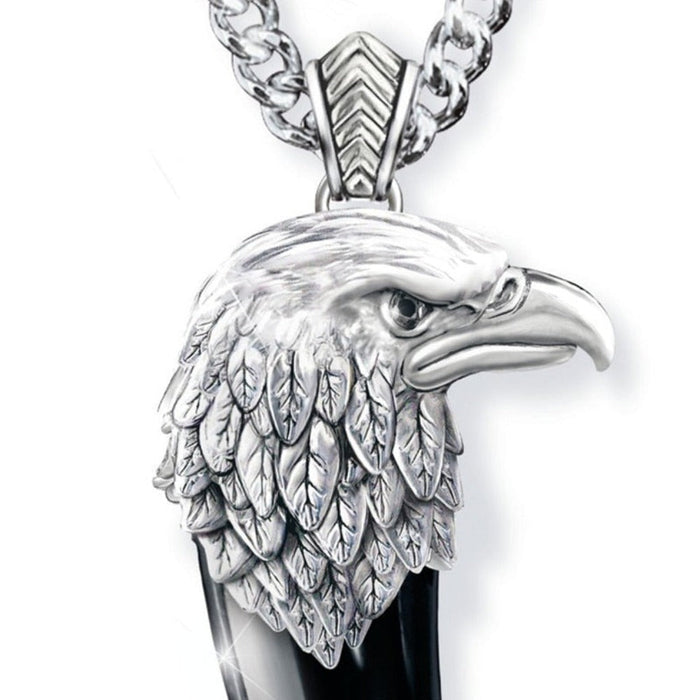 Necklace with Eagle Claw and Head Design: silver, black eagle head and talon/claw-shaped pendant, realistic animal motif styl