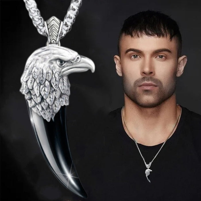 Necklace with Eagle Claw and Head Design: silver, black eagle head and talon/claw-shaped pendant, realistic animal motif styl