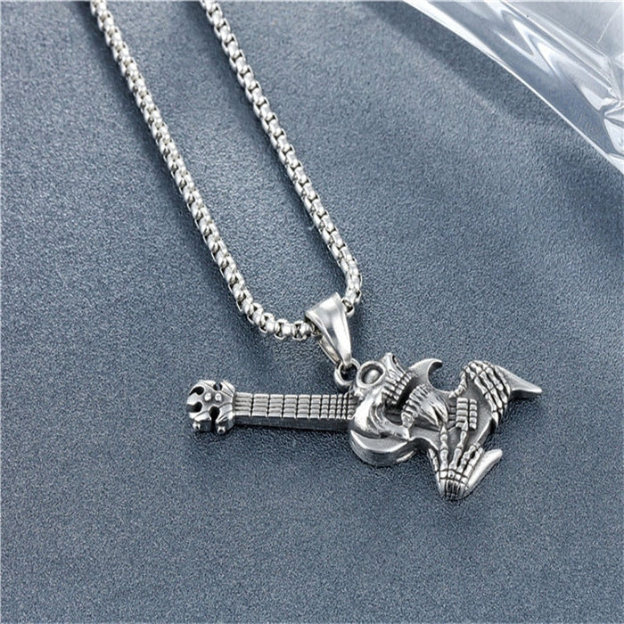 Necklace with Skull Gothic Guitar Design: silver, dark gray skeletal creature/character, gothic cartoon style