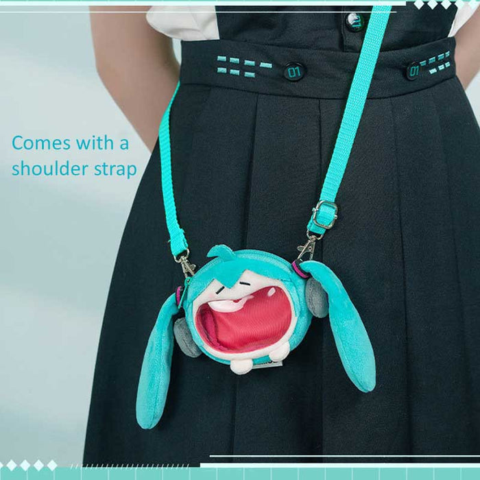 Official Miku Itabag Mini Plush: teal, aqua anime-style teal twin-tailed character, kawaii cartoon style