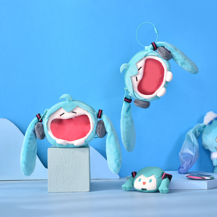 Official Miku Itabag Mini Plush: teal, aqua anime-style teal twin-tailed character, kawaii cartoon style
