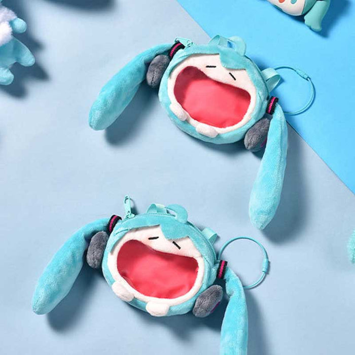 Official Miku Itabag Mini Plush: teal, aqua anime-style teal twin-tailed character, kawaii cartoon style
