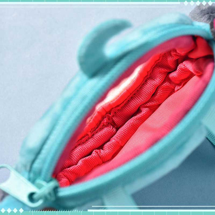 Official Miku Itabag Mini Plush: teal, aqua anime-style teal twin-tailed character, kawaii cartoon style