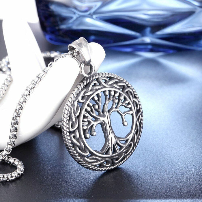 Pendant Necklace with Tree Symbolism: silver tree of life, ornate symbolic style