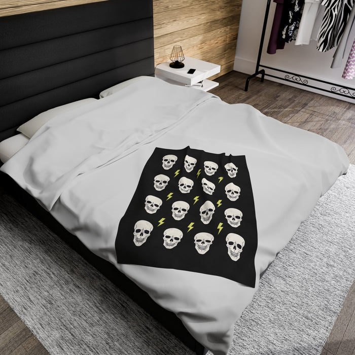 Plush Gothic Skeleton Throw Blanket: black, white skulls and lightning bolts, cartoon graphic style