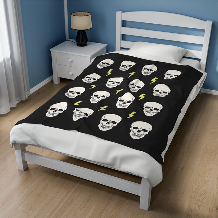 Plush Gothic Skeleton Throw Blanket: black, white skulls and lightning bolts, cartoon graphic style