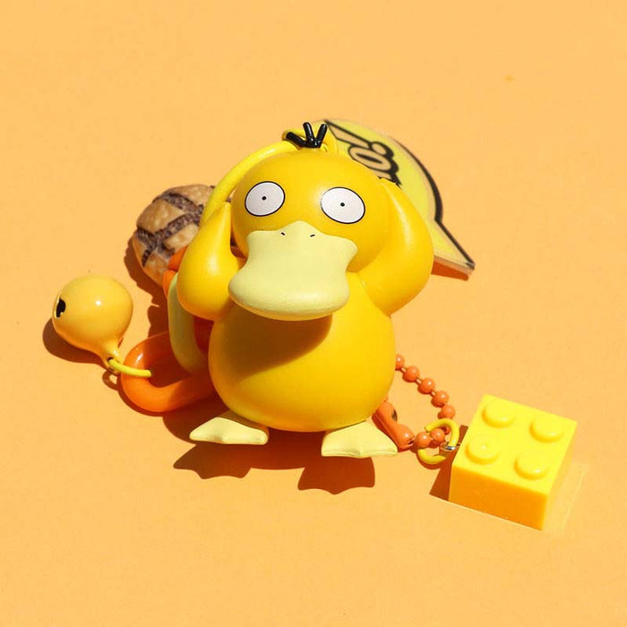 Pokemon Lover Keychain with Accessories: teal, yellow Squirtle-like turtle character, cartoon style